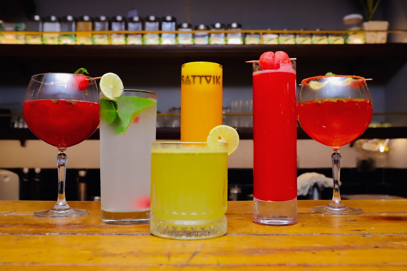 A row of Sattvik coolers and spritzers on the bar counter