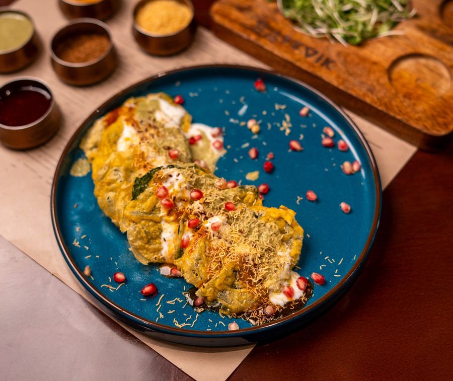 Sattvik patta chaat, crisp spinach leaves with yoghurt and chutney